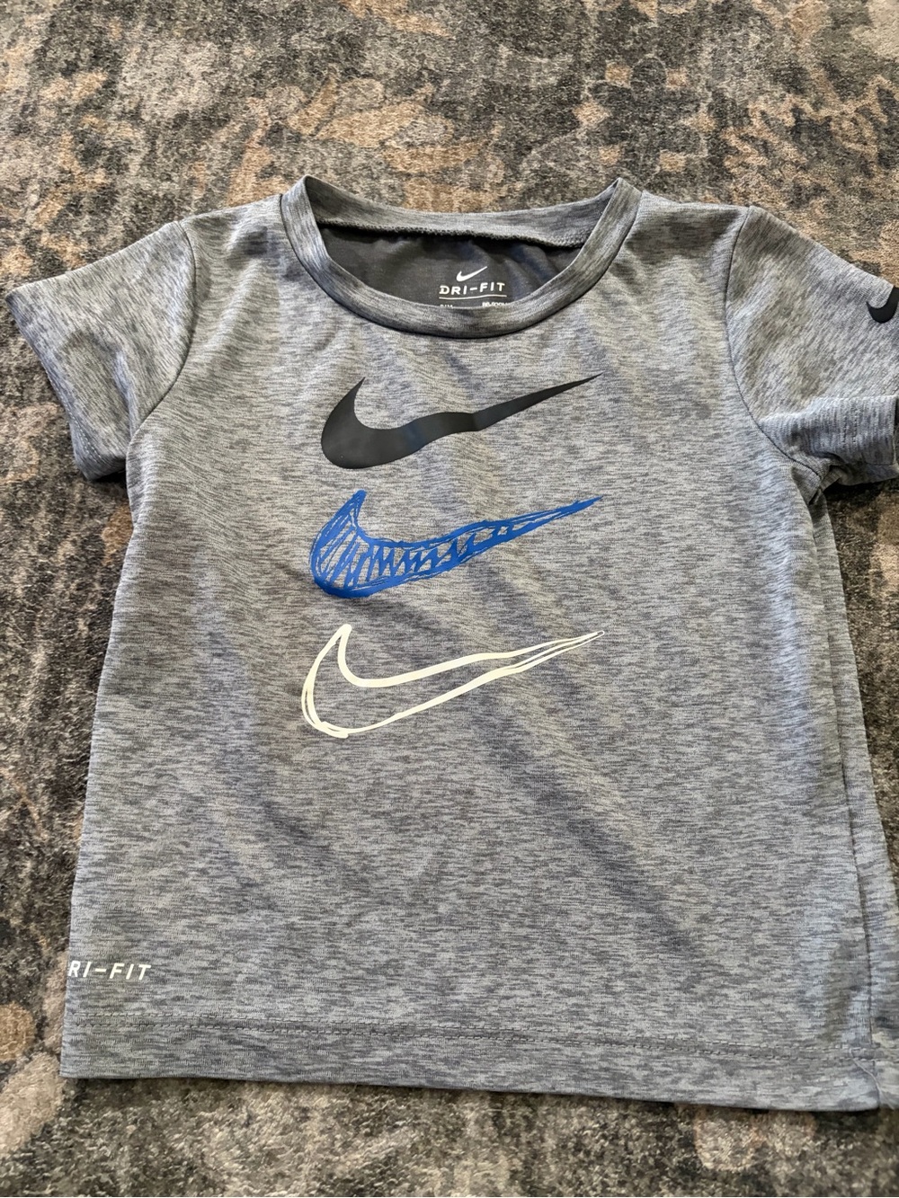 Nike Gray Short Sleeve Tee with Black, Blue, and White Swooshes
